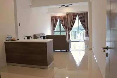 a living room with a couch and a table at ATS Cameron Hotel & Apartments in Cameron Highlands