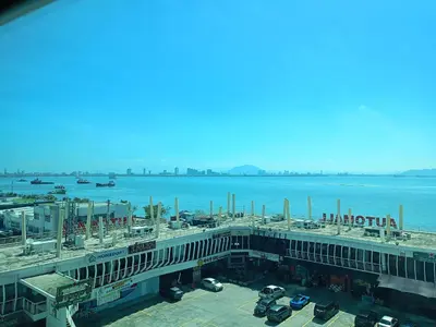 a view of a airport with a large body of water at Urbano Luxury Maritime Suite in George Town