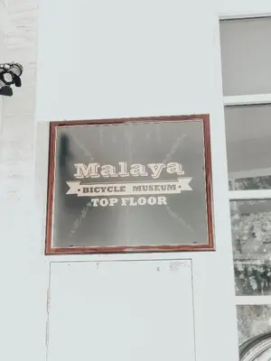 a sign on a wall in a room at Wifi Boutique Hotel in George Town