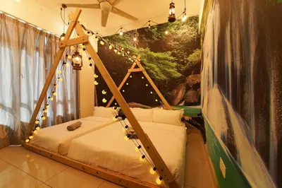 a room with a bed with lights on it at \u5bb6 Majestic Ipoh in Ipoh