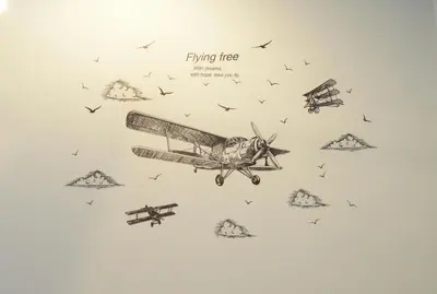 a drawing of two planes flying in the sky at Decozy Homestay (14pax++) in Ipoh