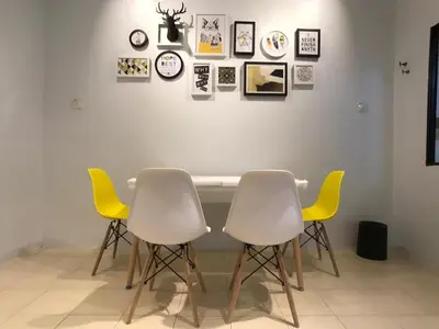 a dining room with three chairs and a table at beNordic -8-10mins Tambun Water Park-10-14Pax in Ipoh