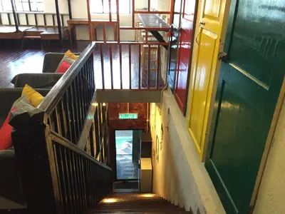 an overhead view of a staircase in a building at Hikers Sleep Port Guesthouse in Cameron Highlands