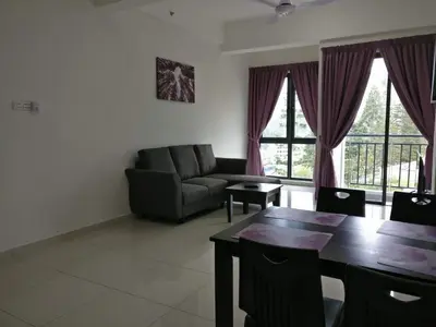 a living room with a couch and a table at SL TR Homstay in Cameron Highlands