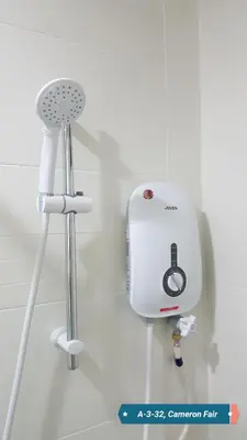 a bathroom with a hair dryer and a hair dryer at SL TR Homstay in Cameron Highlands