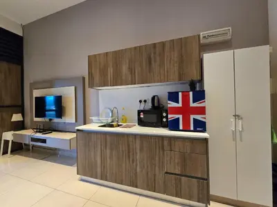 a kitchen with a sink and a counter top at SL TR Homstay in Cameron Highlands