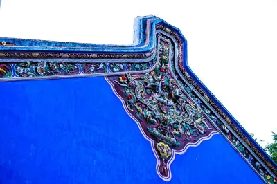 a close up of the side of a blue object at Cheong Fatt Tze - The Blue Mansion in George Town