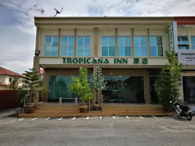 a building with a sign that reads tropicana inn at Tropicana Inn in Sitiawan