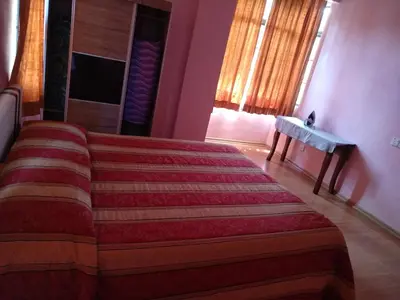 a bedroom with a large bed in a room at Tenggafriz holidays in Cameron Highlands