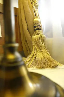a close up of a bottle on a table at Nam Keng Hotel Penang in George Town