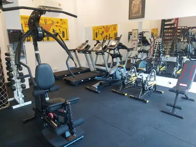 a gym with a bunch of exercise equipment in it at De' Garden Hotel, Butterworth in Butterworth