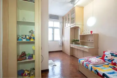 a small room with a bed and a kitchen at •Lovely Home•11Pax+4Bedrooms+Themed•Bukit Mertajam in Bukit Mertajam
