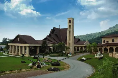 a large building with a clock tower in front of it at •Lovely Home•11Pax+4Bedrooms+Themed•Bukit Mertajam in Bukit Mertajam