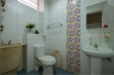 a bathroom with a toilet and a sink at •Lovely Home•11Pax+4Bedrooms+Themed•Bukit Mertajam in Bukit Mertajam