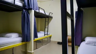 a group of bunk beds in a dorm room at Abby by the river in Ipoh