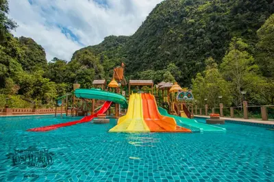 a water park with a slide in the water at Sunway Lost World Hotel in Ipoh