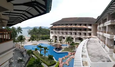 an aerial view of a resort with a swimming pool at The Orient Star Resort Lumut in Lumut