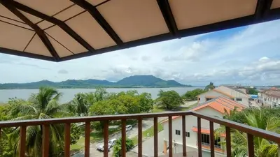 a view of the water from a balcony at The Orient Star Resort Lumut in Lumut