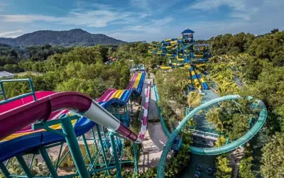 a roller coaster at a theme park at 5-BEDROOM FERRINGHI HOUSE with WIFI , NETFLIX , BBQ SET , 5 MINUTES WALK to BEACH in Batu Ferringhi
