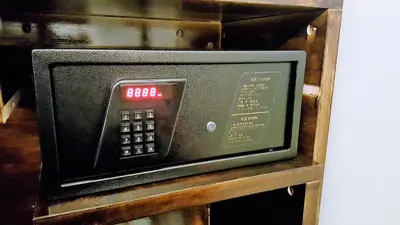 a microwave oven sitting on top of a table at Super 8 Hotel @ Georgetown in George Town