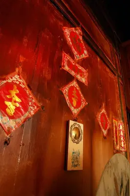 a wall with a bunch of decorations on it at Coffee Atelier in George Town