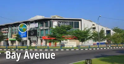 a building with a bay avenue sign in front of it at Apple 1 Hotel Queensbay in Bayan Lepas