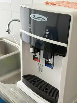 a coffee maker sitting on top of a counter at Taiping Centre Point Suite 7 by BWC in Taiping