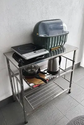 a table with a pot on top of it at Taiping Centre Point Suite 9 by BWC in Taiping