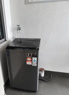 a water tank with a sink on top of it at Taiping Centre Point Suite 9 by BWC in Taiping