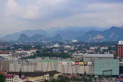 a view of a city with mountains in the background at PM Octagon Ipoh Duplex Suite (4-12paxs) in Ipoh