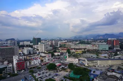 a city with a lot of buildings and cars at PM Octagon Ipoh Duplex Suite (4-12paxs) in Ipoh