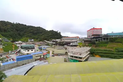 a view of a city with buildings and trees at Zarania Hillhomes Cameron Highlands in Cameron Highlands