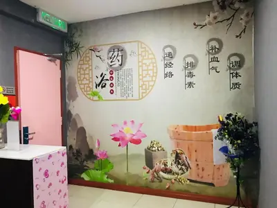 a room with a wall with writing on it at Home Inn Hotel in Ipoh