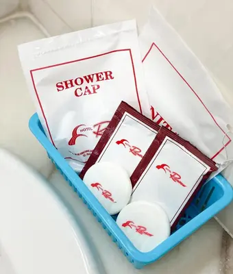a box of white balls with a shower car sign at Hotel Rainbow in Cameron Highlands