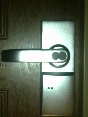 a close up of a door with a metal latch at Hotel Remix in Cameron Highlands