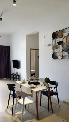 a dining room with a table and chairs and a mirror at Misty Wonderland Cameron Next to Night Market 9 PAX in Cameron Highlands
