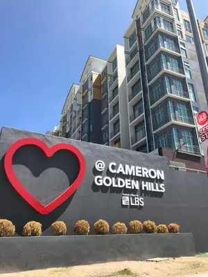 a sign for the canadian golden huts in front of a building at Vin-Cottage Cameron Golden Hills (Next to Night Market) in Cameron Highlands