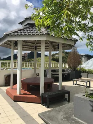 a gazebo with a picnic table and a bench at Vin-Cottage Cameron Golden Hills (Next to Night Market) in Cameron Highlands
