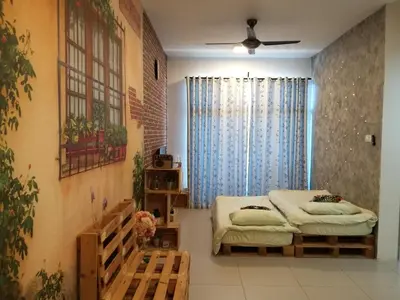 a bedroom with two beds and a window at Vin-Cottage Cameron Golden Hills (Next to Night Market) in Cameron Highlands