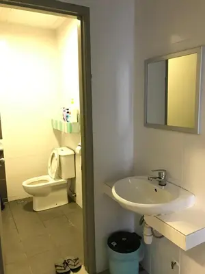 a bathroom with a sink and a toilet and a mirror at Vin-Cottage Cameron Golden Hills (Next to Night Market) in Cameron Highlands