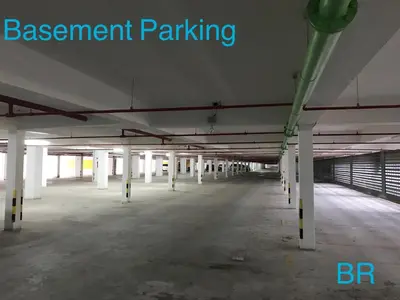 an empty parking lot in a parking garage at Blue Romance Mermaid Cameron Stay 9 pax Next to Night Market in Cameron Highlands