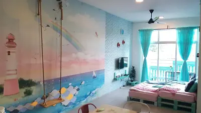 a bedroom with a rainbow mural on the wall at Blue Romance Mermaid Cameron Stay 9 pax Next to Night Market in Cameron Highlands