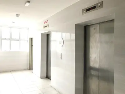 a hallway of an office building with a elevator at Blue Romance Mermaid Cameron Stay 9 pax Next to Night Market in Cameron Highlands