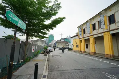 a street sign on the side of a street at Grand FC Hotel in George Town