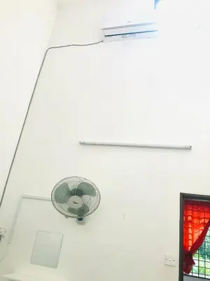 a white room with a fan on the ceiling at Homestay Lestary near Taiping Fast WIFI Netflix in Taiping