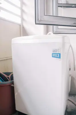 a white water heater with a window on top of it at TheDaun Homestay Seri Iskandar, Perak in Seri Iskandar