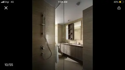 a bathroom with a shower and a sink at By the sea Beach BABY in Batu Ferringhi