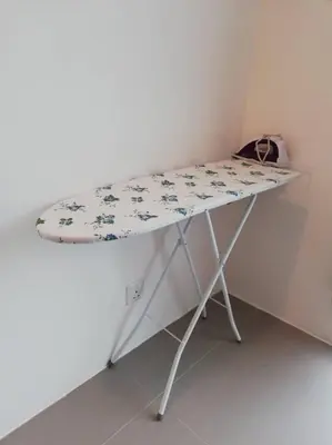 a white table with a cloth on top of it at Casa D'One Homestay D Pasar Malam in Cameron Highlands