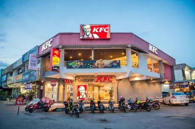 a bunch of motorcycles parked in front of a building at Northern Lodge Hotel in Sungai Petani