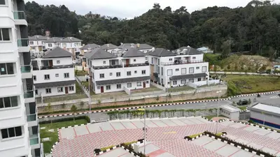 an aerial view of a city with white buildings at My Home Apartment - The Quintet Condo in Cameron Highlands